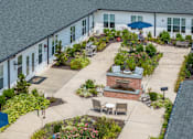Thumbnail 3 of 27 - Patio with a Fireplace at Spring Arbor of Crofton, Maryland