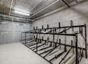 Thumbnail 21 of 28 - A storage room with a metal rack system.