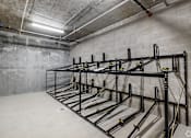 Thumbnail 2 of 6 - A storage room with a metal rack system.