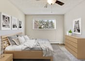 Thumbnail 5 of 11 - Bedroom With Ceiling Fan at Virginia Park, Lakewood, CO