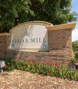 Sugar Mill Apartments in Addis, LA photo of sugar mill's monument sign