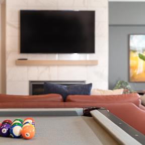 A pool table with a set of billiard balls on it.