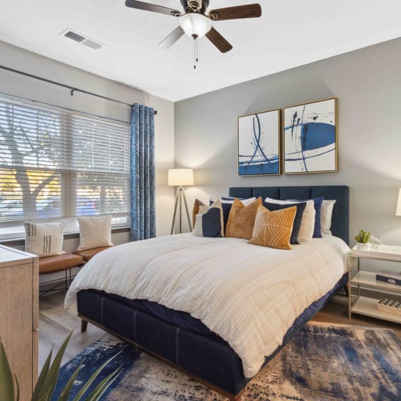 Sage at 1240 apartments in Mount Pleasant South Carolina photo of bedroom with hardwood flooring and ceiling fan