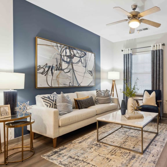 Sage at 1240 apartments in Mount Pleasant South Carolina photo of living room with hardwood floors and ceiling fan