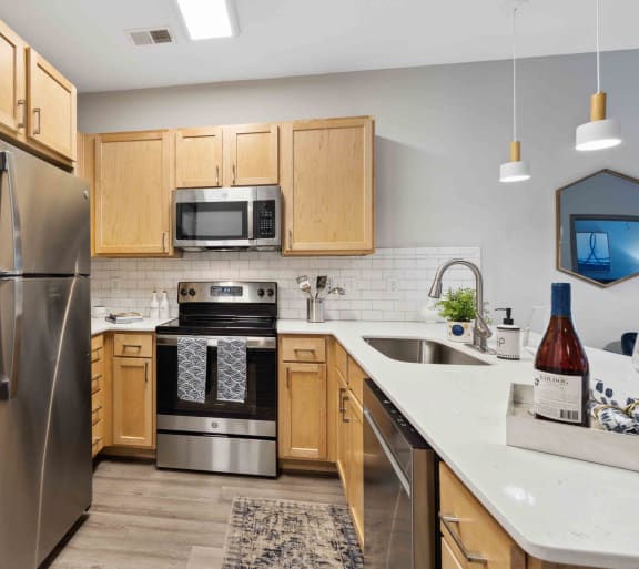 Sage at 1240 apartments in Mount Pleasant South Carolina photo of bedroom with hardwood flooring and ceiling fan