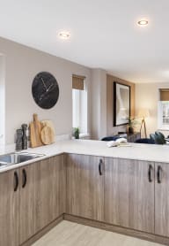 a bedroom with a bed and desk in a 555 waverly unit