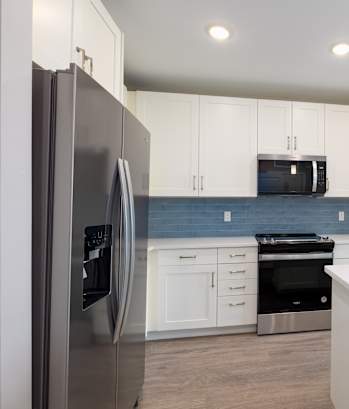 Kitchen with White Cabinets at Imperial Crossing Luxury Apartment Homes, Florida, 34134