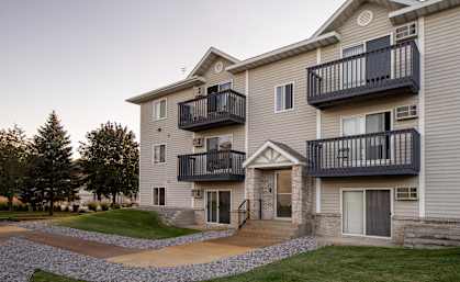 a building with two balconies on the side of it