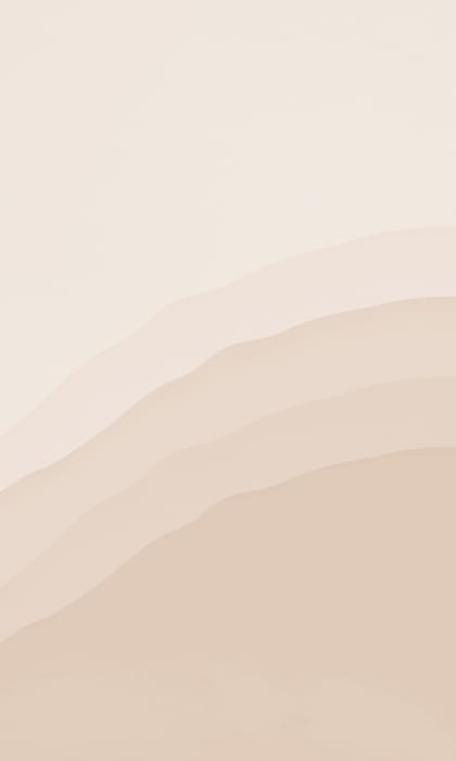 a beige wallpaper with a wave pattern on it