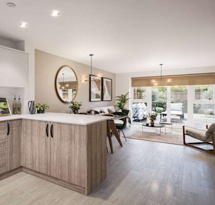 an open plan kitchen and dining area in a 555 waverly unit