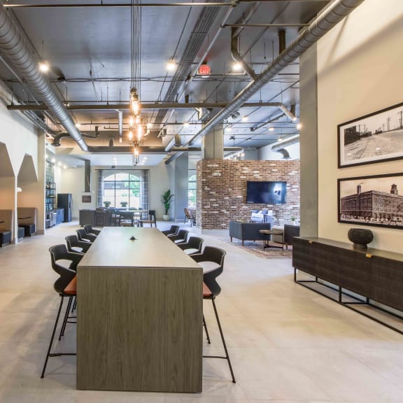 a large meeting room with a long table and chairs