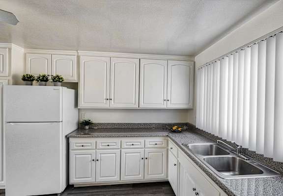 View of Kitchen at Serrano Apartments, West Covina, California