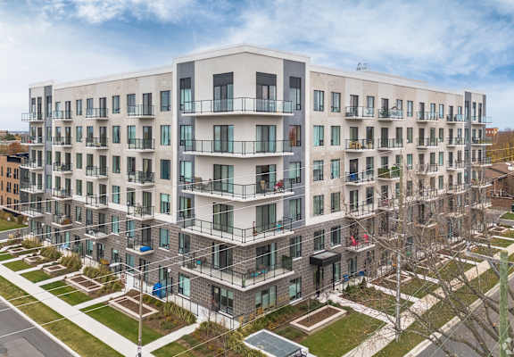 a large apartment building with scaffolding in front of it