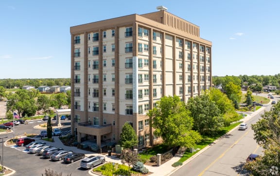 aerial view of apartment building and parking lot