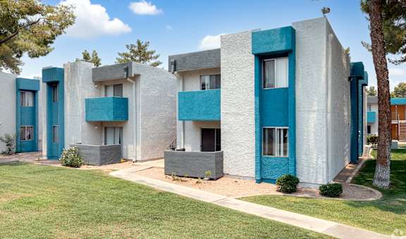 A row of modern style houses with blue trim. at Sycamore Square  Apartments, Arizona, 85202