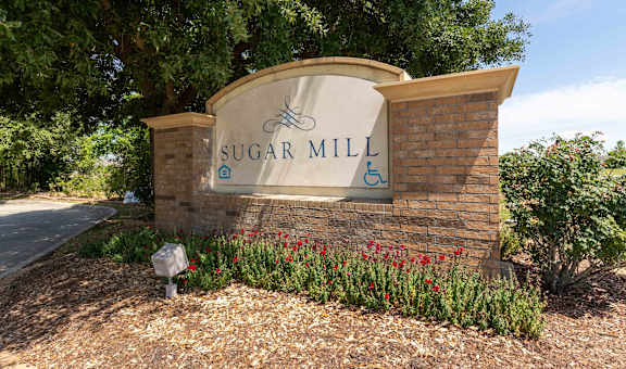 Sugar Mill Apartments in Addis, LA photo of sugar mill's monument sign
