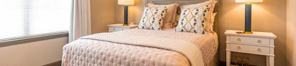 a bedroom with a bed and a window at Kingston Crossing Apartment Homes, Bossier City, 71111