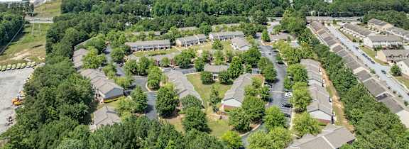 an aerial view of a neighborhood with houses and trees  at Greens at Stonecreek, Georgia, 30038