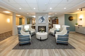 lobby with chairs and a fire place