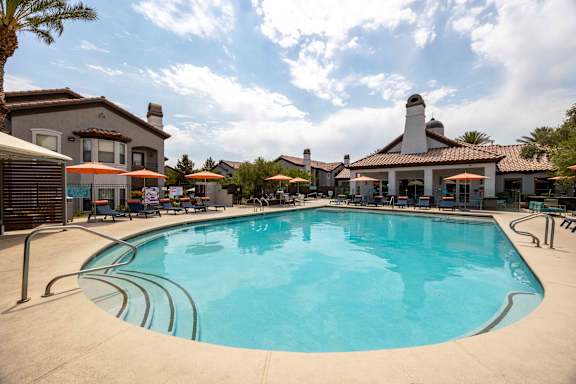 A large swimming pool in a residential area.