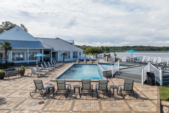 a bedroom with a bed and a ceiling fan at Lakeshore Pointe Apartment Homes, Brandon, MS, 39047