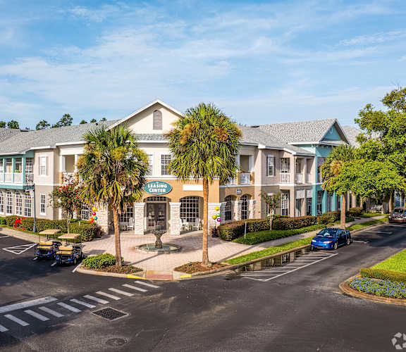 A street view of a building with a sign that reads "Cascade".