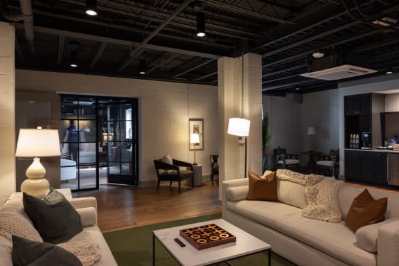 a living room with couches and a coffee table