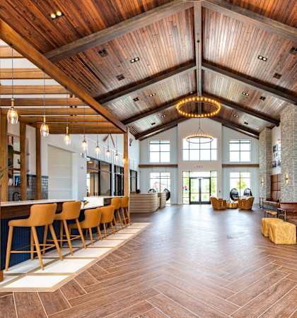 A large open space with wooden floors and furniture.