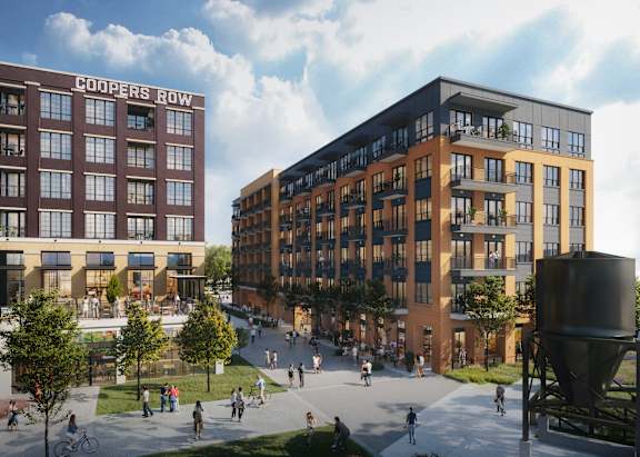 A rendering of a city street with people walking and biking.