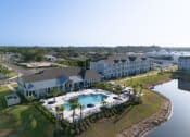 Thumbnail 26 of 92 - an aerial view of the resort with a swimming pool