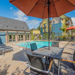 Latitude Apartments in Happy Valley- Pool with Lounge Chairs