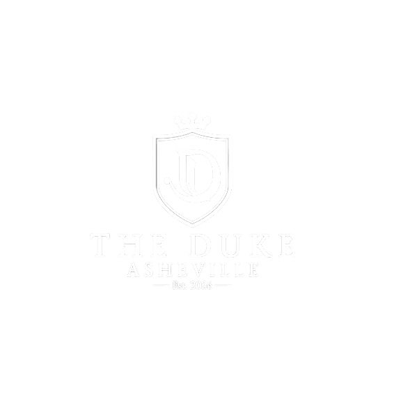 The logo for The Duke Asheville, established in 2026, features a shield with a crown on top and the letter D in the center.