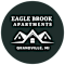 A logo for Eagle Brook Apartments in Grandville, MI.