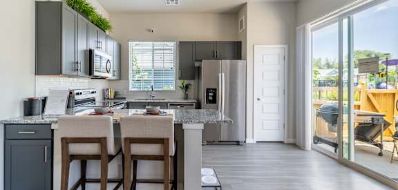 Gourmet Kitchen with Island at Avilla Eastlake, Thornton, CO 80241