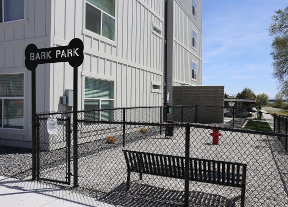 a park bench in front of a building