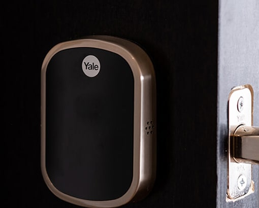 a yale smart lock on a door