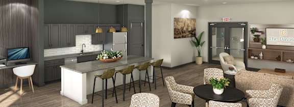 A modern living room with a kitchen area in the background.