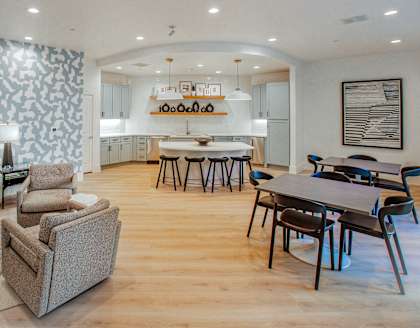 a living room with a dining room and a kitchen