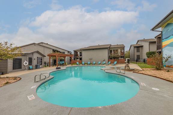 our resort style swimming pool is surrounded by our apartments at our apartments