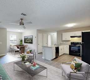 a living room with a couch and a glass coffee table