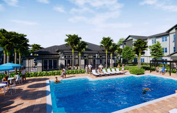 A large swimming pool with people around it and a building in the background.