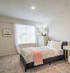 Bedroom with Bed at Monarch Meadows, Riverton, UT