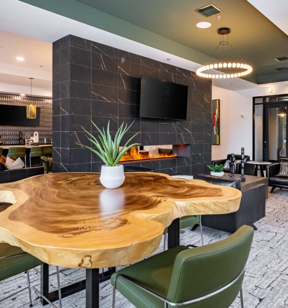a games room with a pool table and a bar