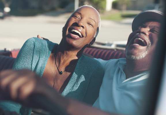 Laughing Couple at Hadley Apartments - A 55+ Lifestyle Community