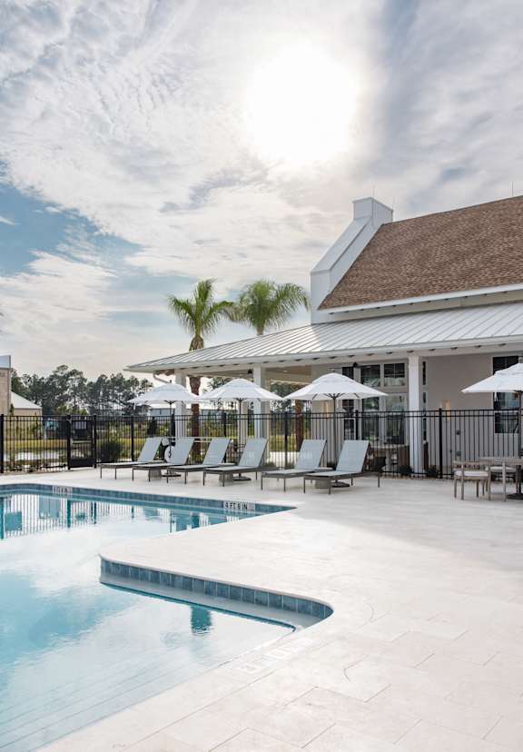 a large living room with a kitchen and a dining room at Saltaire Apartment Homes, Santa Rosa Beach Florida