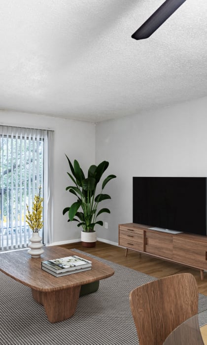 a living room with a couch and a table