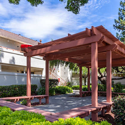 a wooden pavilion in a garden at Cowell Terrace Apartments California