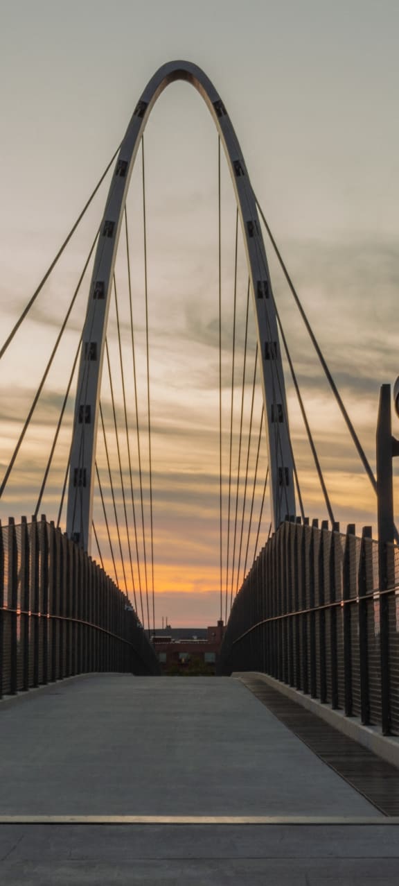 the bridge to the city at sunset