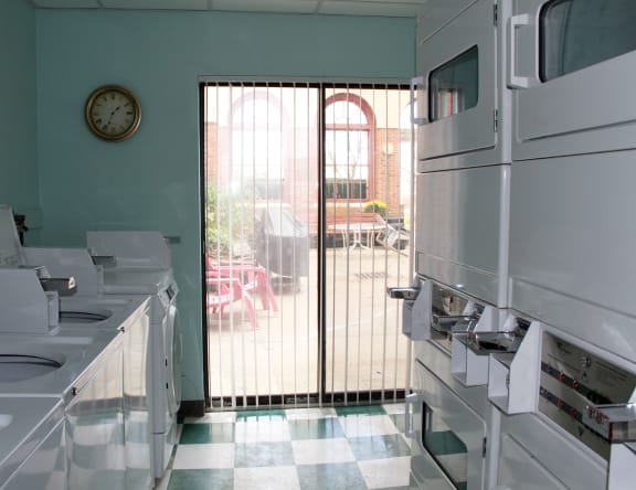 an empty kitchen with a door to a patio