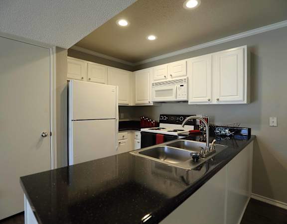 kitchen with dark countertops